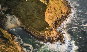 A rocky shoreline, seen from the air