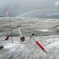 Photo of an ice pick and other tools in glacier