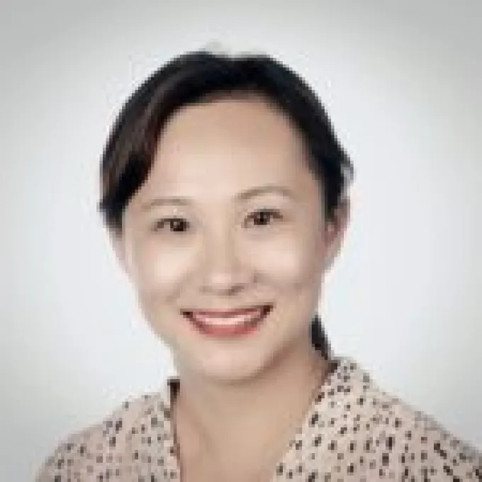 "headshot of associate professor Yuanzhi Tang"