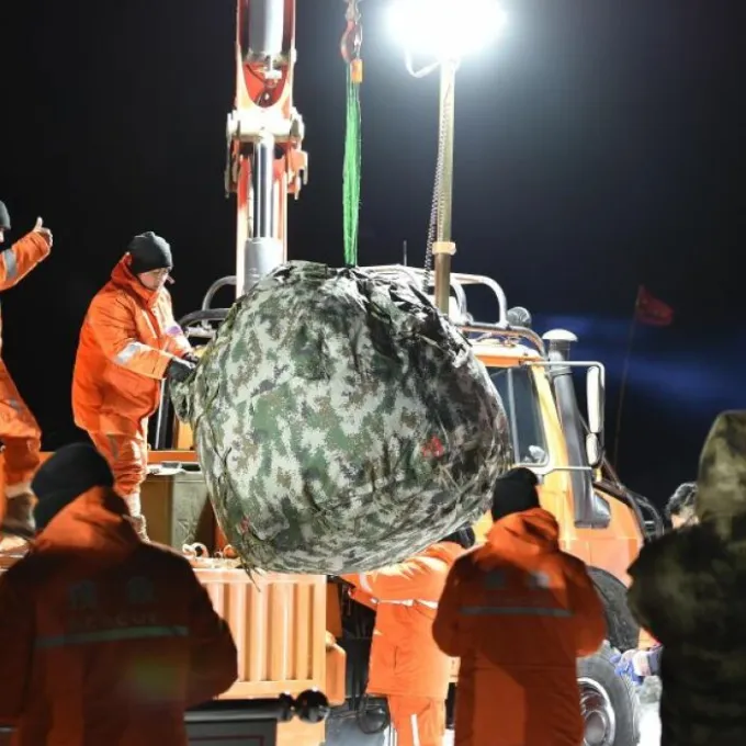 The Chang'e 5 return capsule containing the Earth's newest moon rocks is loaded into a truck. Credit: Xinhua News Agency / Getty Images